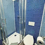 Quarto em Acomodações Particulares And Parking Assistance *